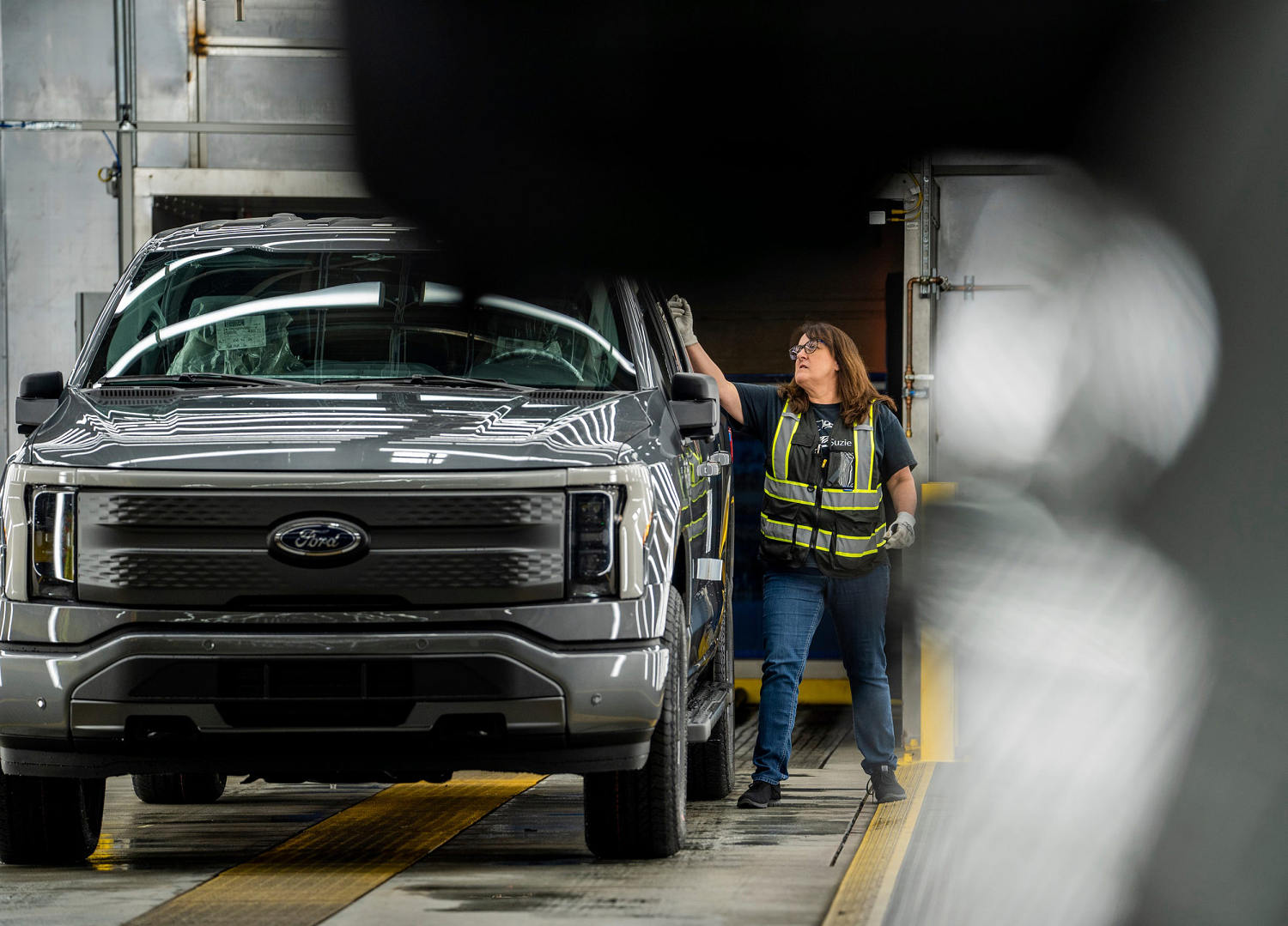 As electric vehicle demand slows, workers caught in the middle face an uncertain future As electric vehicle demand slows, workers caught in the middle face an uncertain future