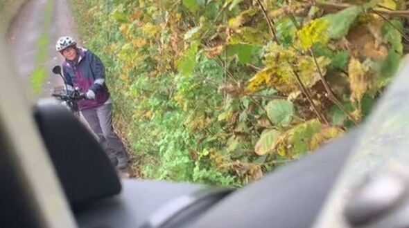 Moment stubborn cyclist and lorry driver get into heated row with both unable to pass