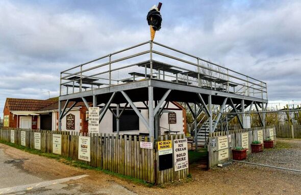 Seaside village beach club ordered to tear down ‘metal monstrosity’ outdoor seating area