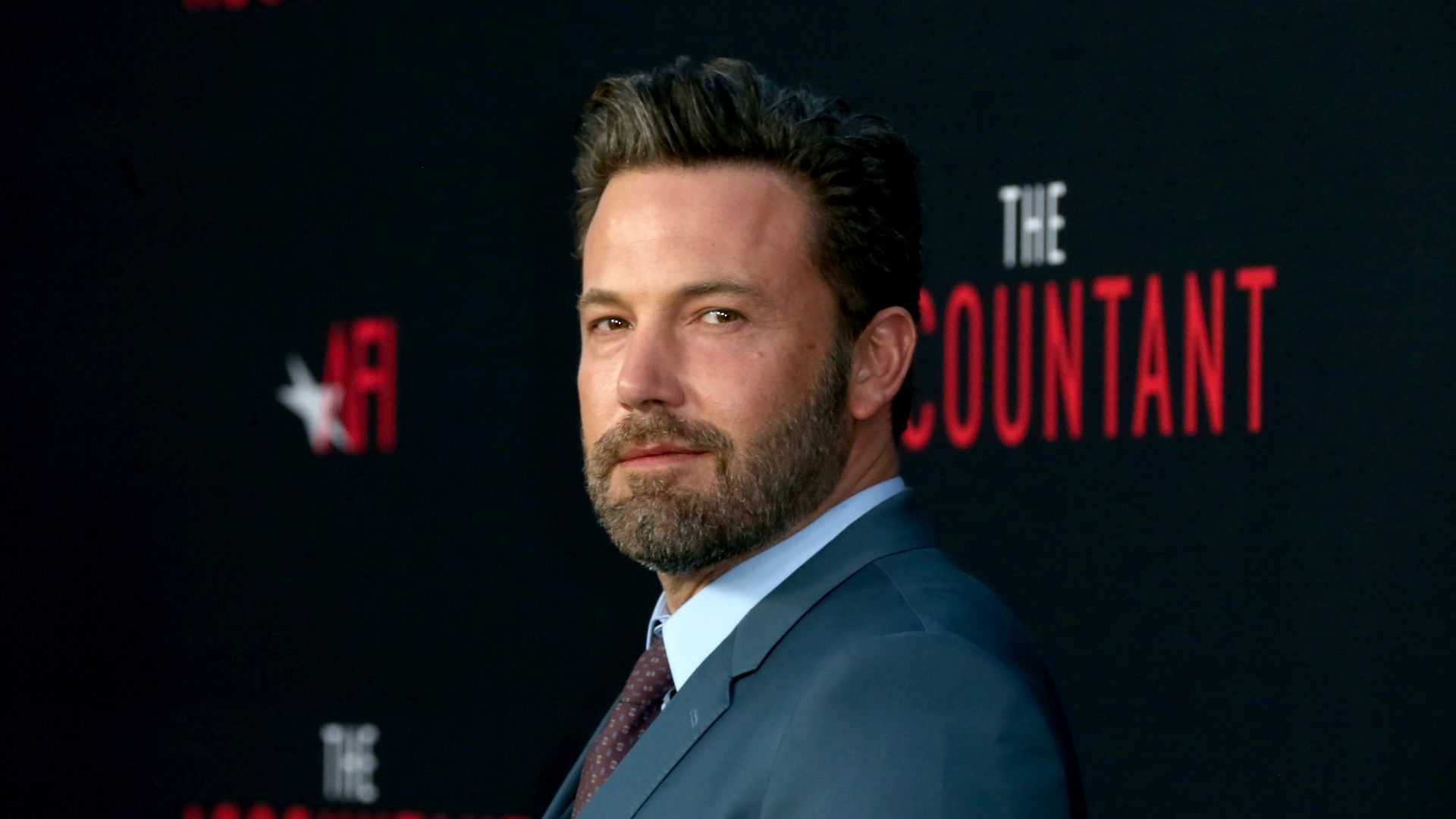 Ben Affleck, 51, looks incredibly youthful as he steps out clean-shaven in New York for father-son date