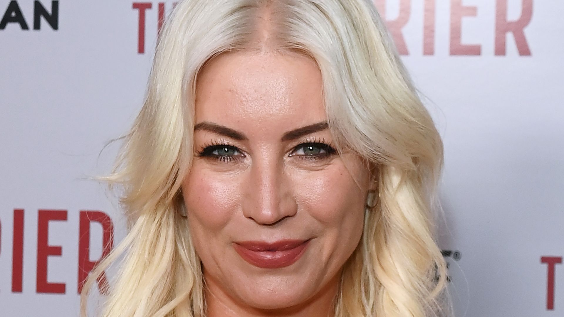 Denise Van Outen wows in daring animal print swimsuit as she celebrates Easter in Dubai