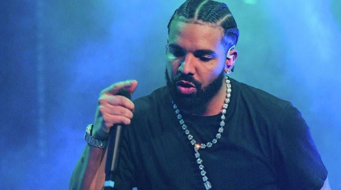 Drake stops concert to promise fan he’ll pay off his late mother’s mortgage