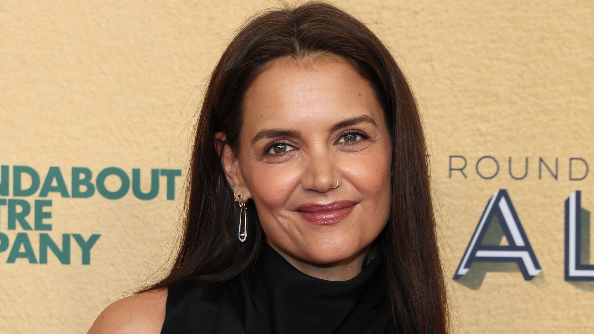 Katie Holmes stuns in body-skimming dress in first appearance since ‘false’ Tom Cruise reports