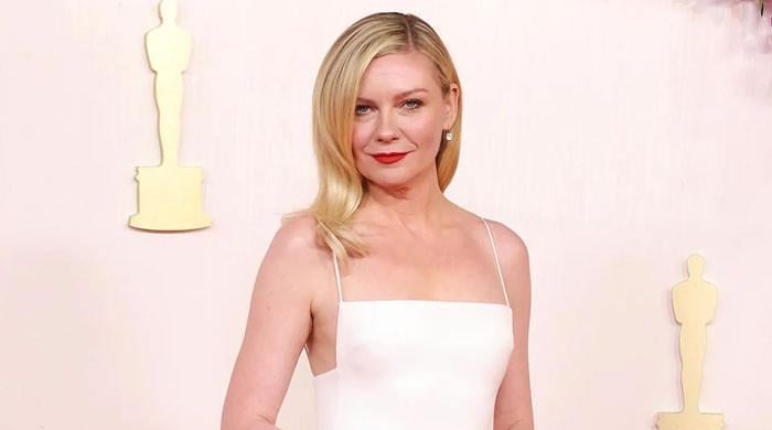 Kirsten Dunst almost lands on her face at 2024 Oscars: Watch