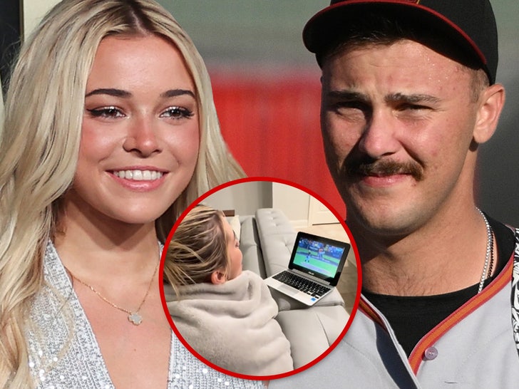 Olivia Dunne Watches Boyfriend Paul Skenes’ Game From Tiny Laptop