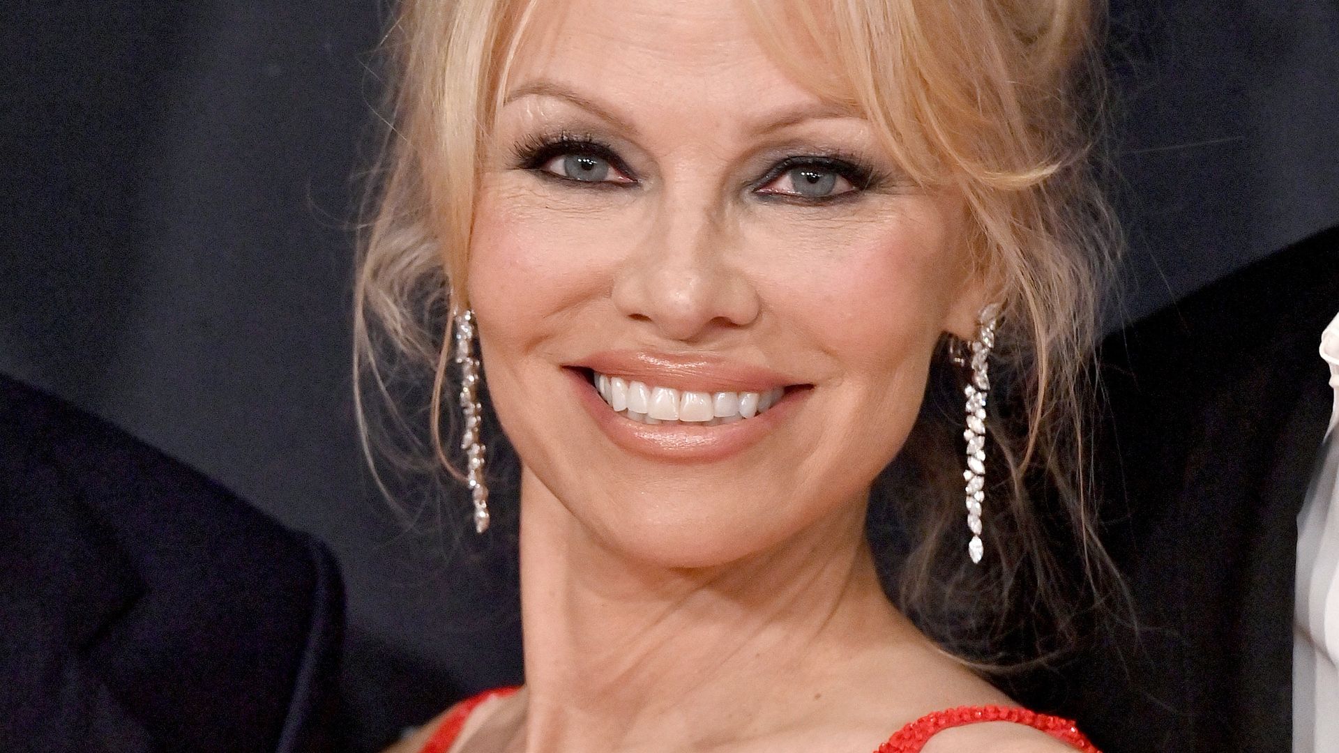 Pamela Anderson looks nearly-nude in flesh-colored catsuit for barefaced photoshoot at 56