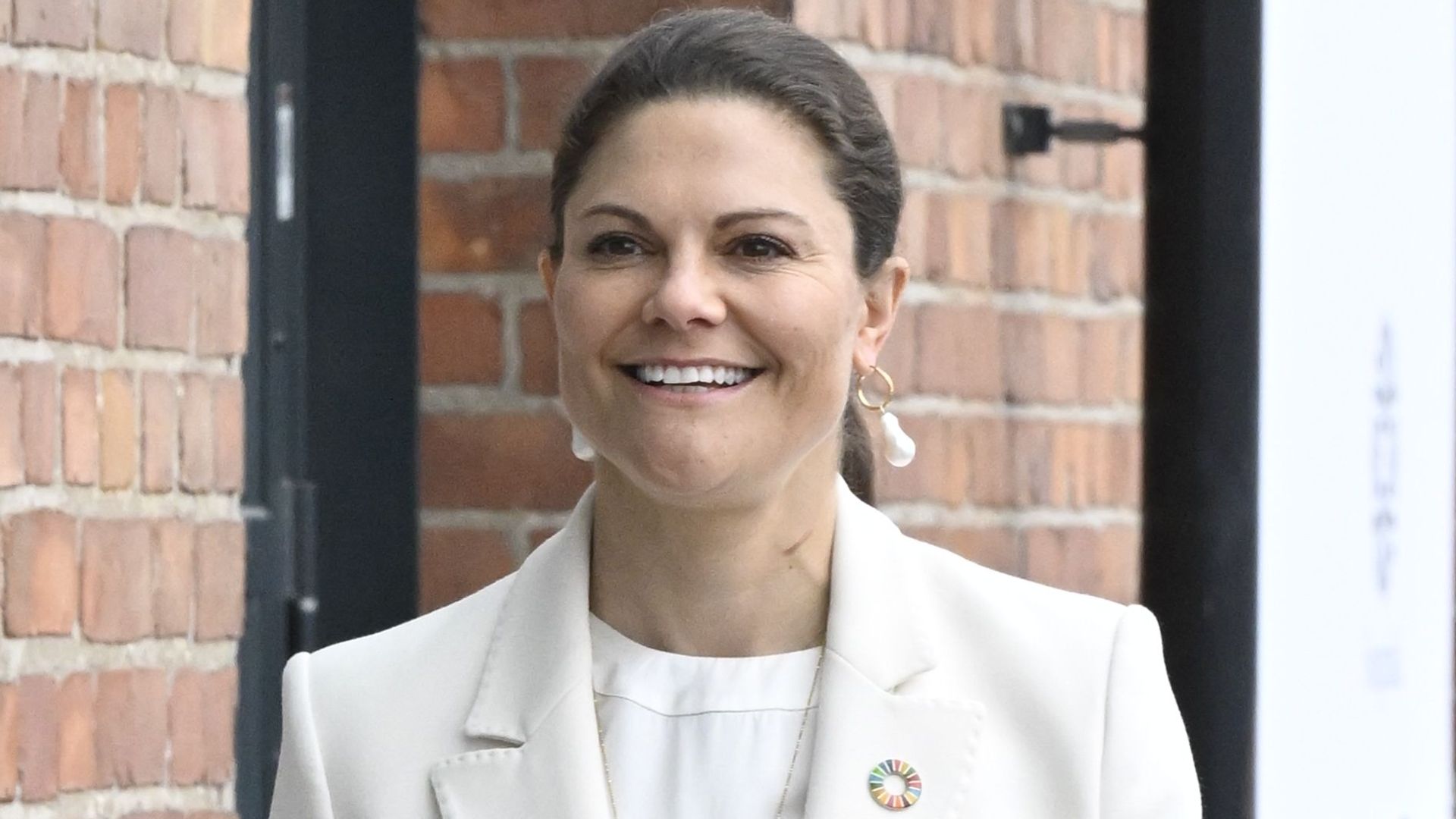 Crown Princess Victoria is the epitome of elegance in fitted power suit