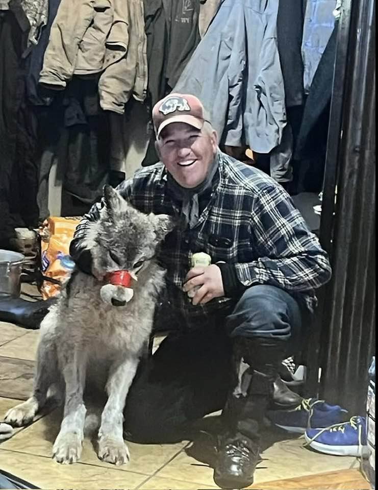 Cruel hunter parades tortured wolf with TAPE around its mouth before taking wounded animal to bar & finally killing it