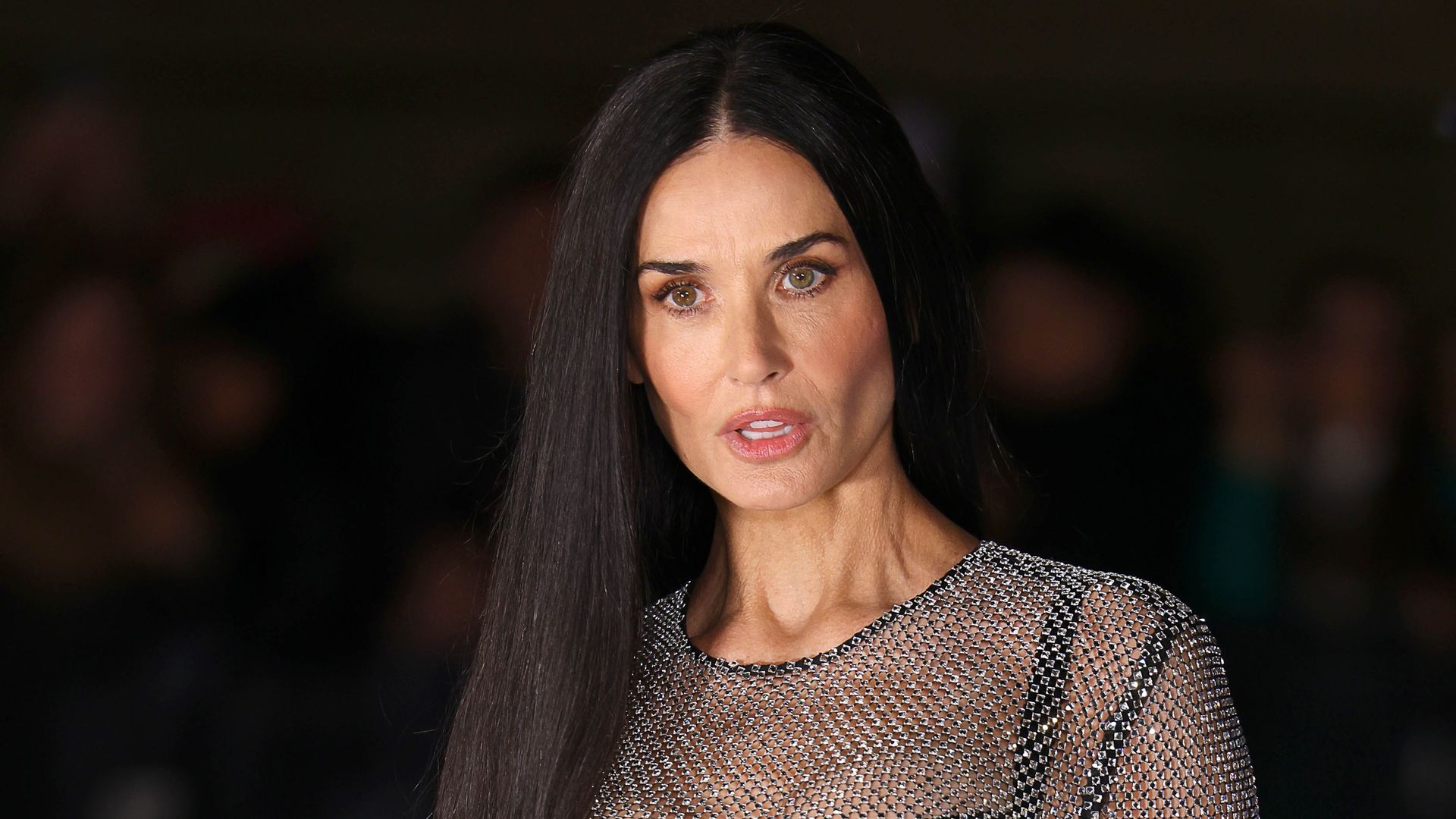 Demi Moore is a diamond in Milan wearing glittering sheer gown
