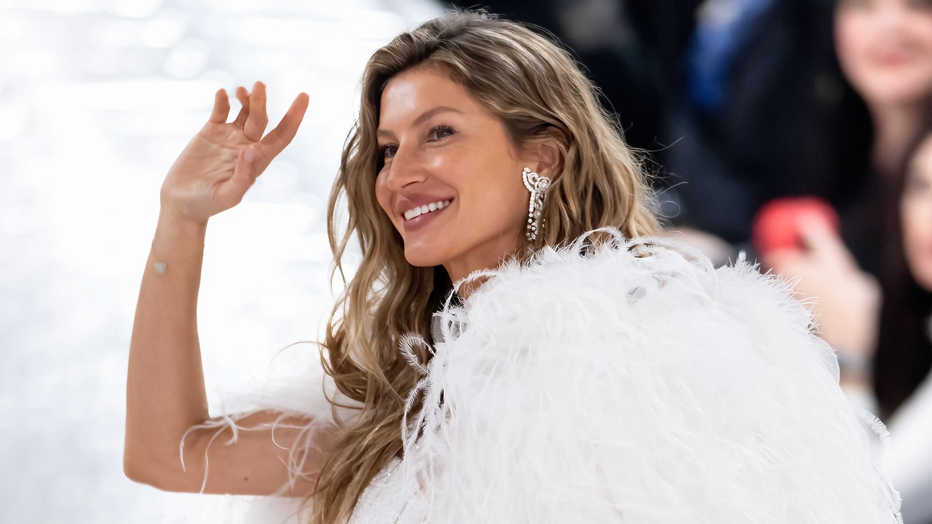 Gisele Bündchen is angelic in the most sensational leg-lengthening bridal suit