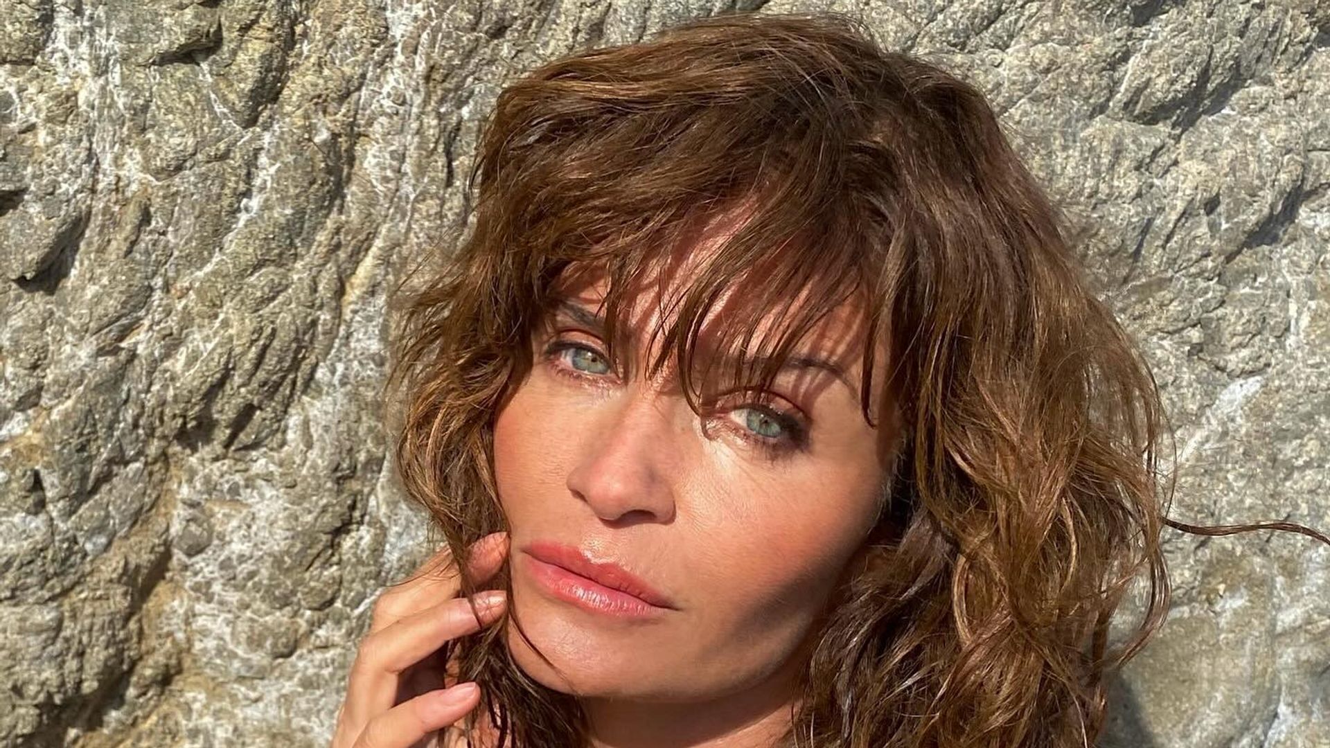 Helena Christensen, 55, has barely aged in phenomenal throwback bikini photos