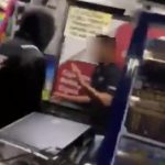 Horrifying moment hooded gang film themselves repeatedly punching and beating shop worker after breaking into store