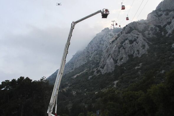 Horror as more than 40 people left stranded above mountain in deadly cable car incident