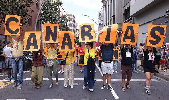 Incredible pictures show scale of Tenerife protest as 120k march against overtourism
