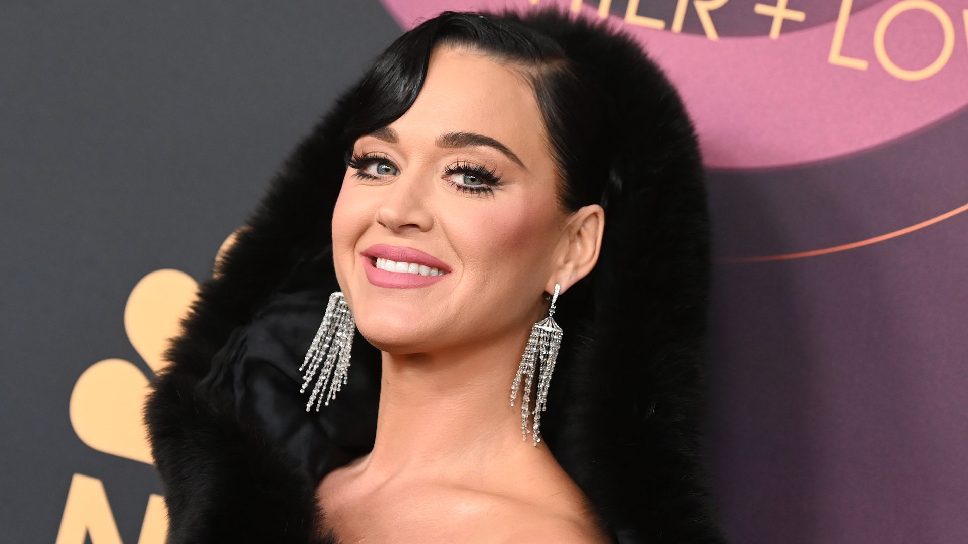 Katy Perry cosies up in knitted outfit with sky-high boots you need to see