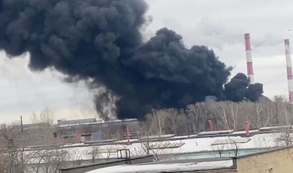 Moment massive plume of black smoke rises after Russian plant explodes into fireball