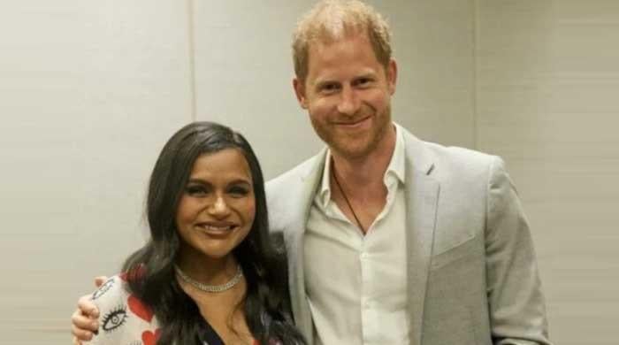 Prince Harry ditches Meghan Markle to pose with her friend?
