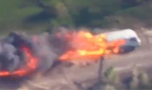 Insane moment Ukrainian drone annihilates Russian vehicle in huge fireball