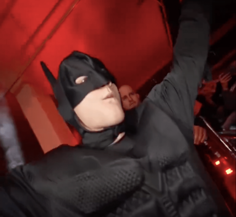 MMA star walks to cage in Batman costume… before winning with brutal chokehold and gifting opponent a CHOCOLATE bar