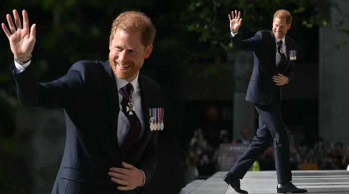 Prince Harry puts on brave face with solo appearance at St Paul’s Cathedral