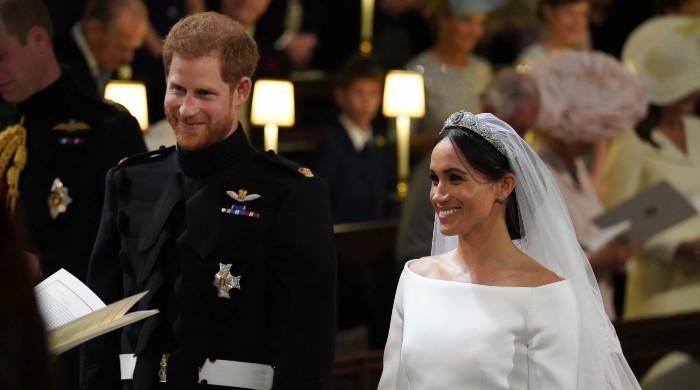Prince Harry’s instant reaction revealed when he saw Meghan Markle on their wedding day