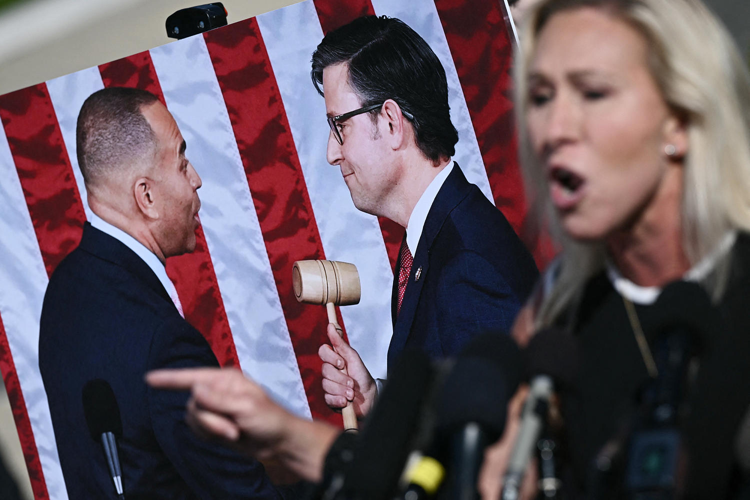 Rep. Marjorie Taylor Greene says she will force a vote to oust Speaker Mike Johnson next week