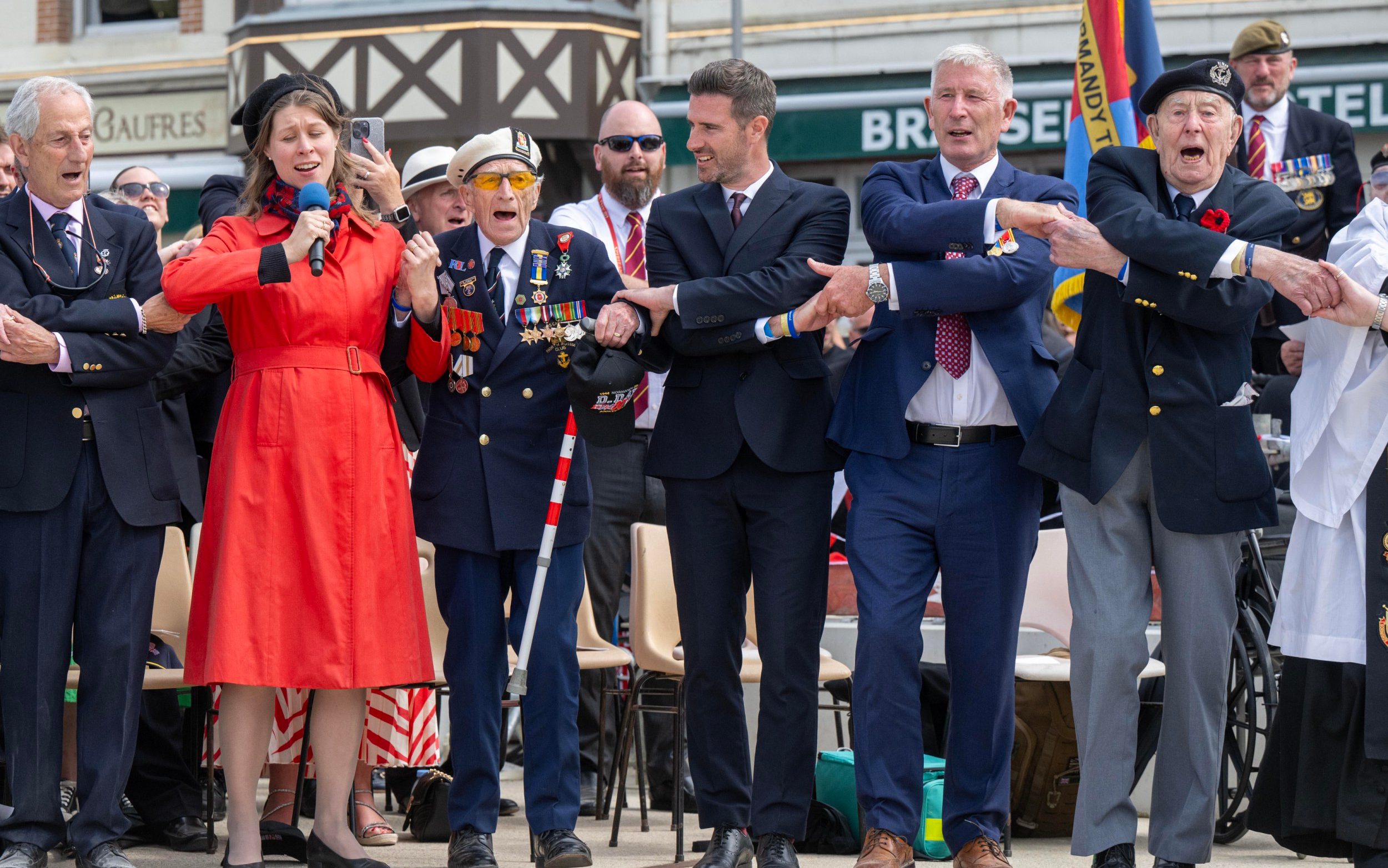D-Day 80th anniversary: Veterans fight back tears in Auld Lang Syne singalong