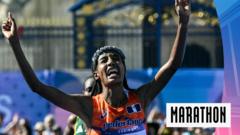 ‘Absolutely remarkable!’ Hassan wins marathon in dramatic sprint finish