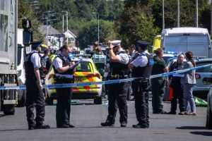 Accused in U.K. knife attack that killed 3 girls charged with terrorism