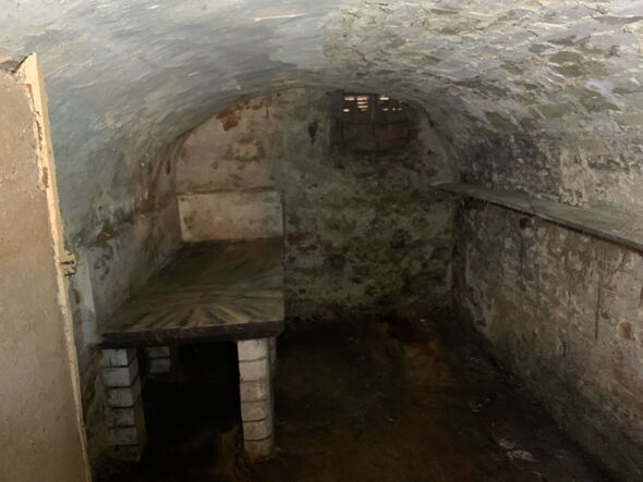 Shopkeeper unearths chilling police cells under store where notorious UK killer was kept
