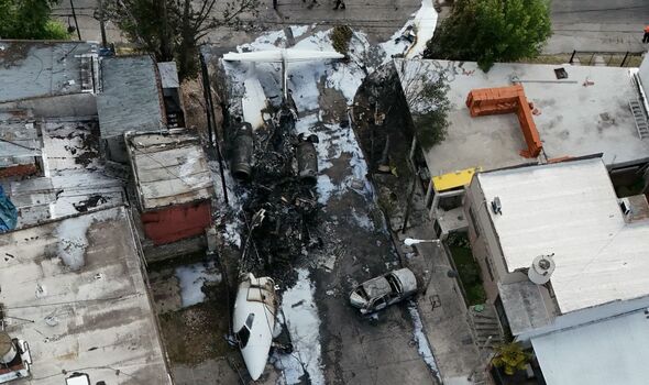 Horror plane crash with ‘two dead’ as jet smashes into street near airport