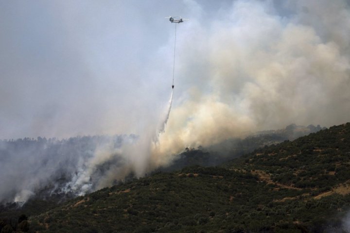 Turkey sends firefighting aircraft to Syria as wildfires rage on both sides of the border