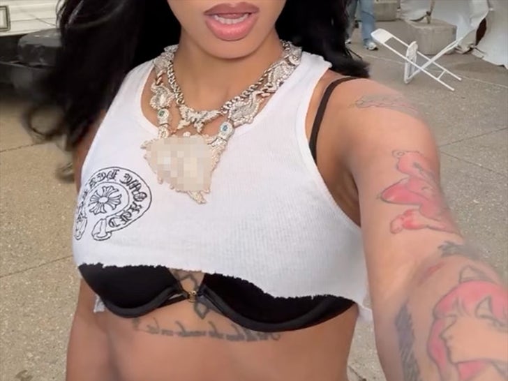 Guess The Rapper Showin’ Off Her Big Bling!