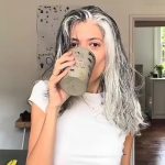 Everyone thinks I’m in my 50s because of my long grey hair – they are shocked to find out my real age