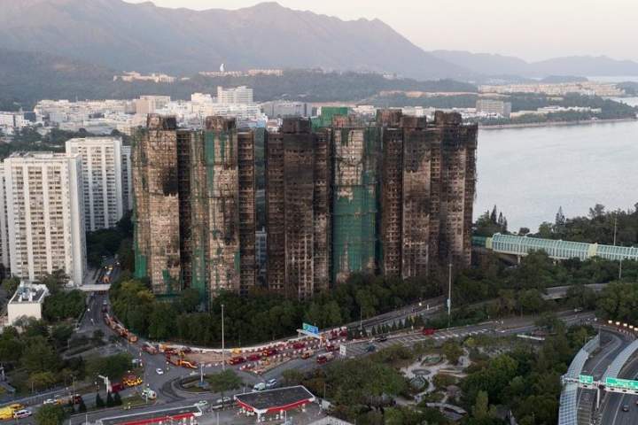 Canadian watched childhood home burn as Hong Kong blaze killed more than 100 people