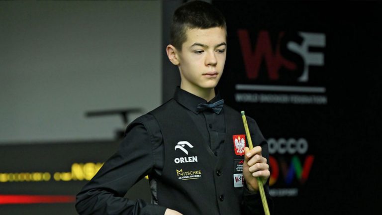 ‘Frightening’ boy wonder aged 14 makes history as he WINS the IBSF World Snooker Championship in Qatar