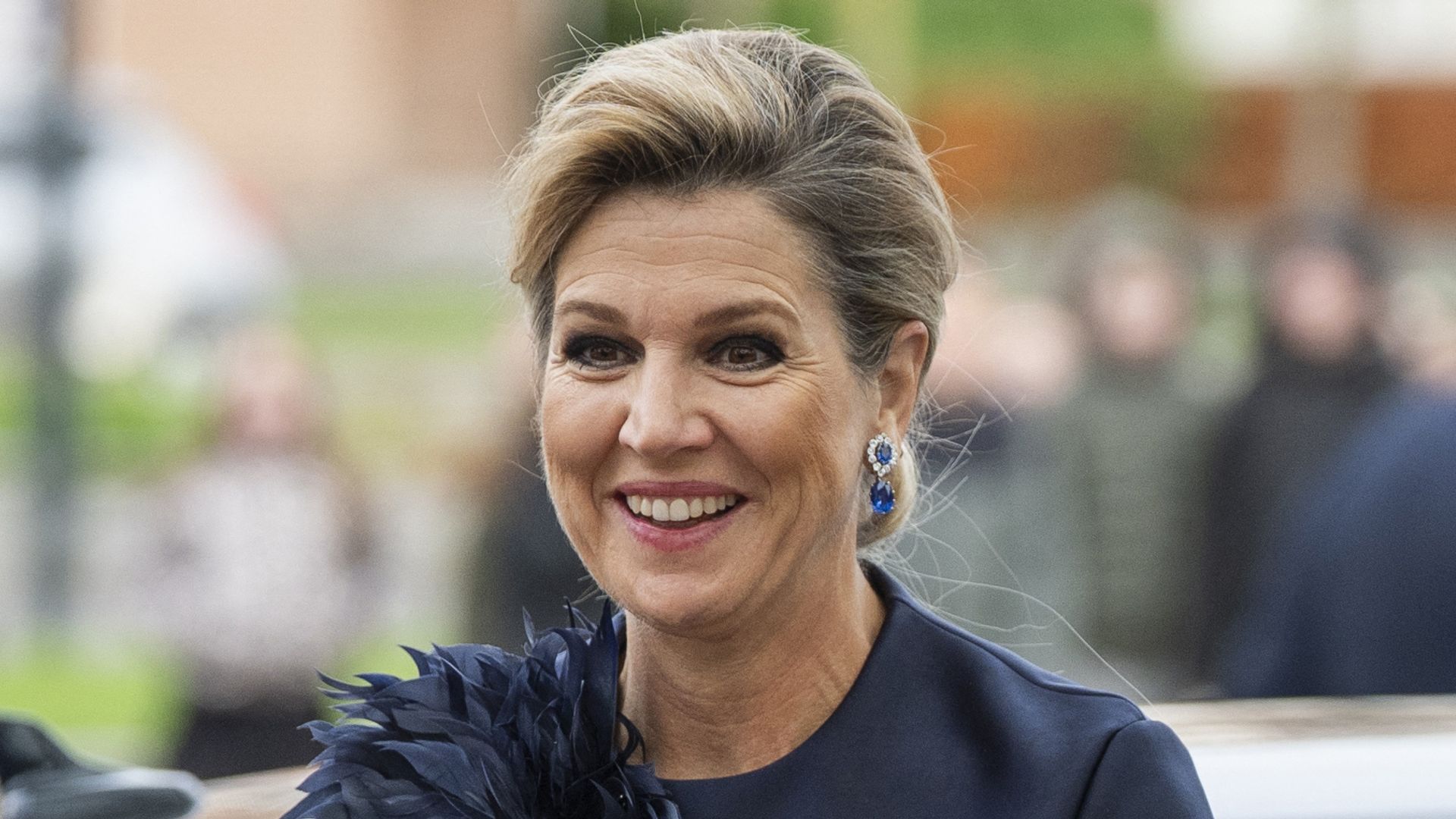 How to style satin in your 50s: Queen Maxima’s top has a feathered detail that stole the show