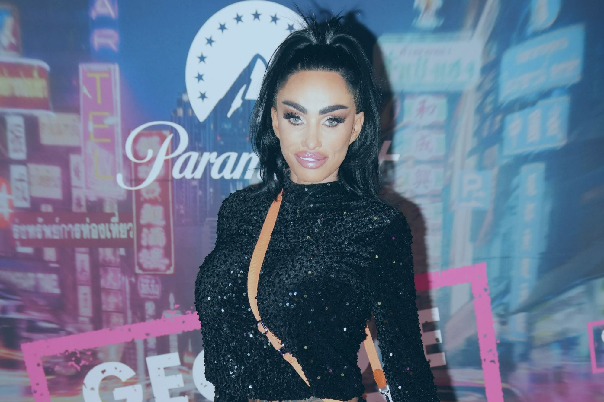 Katie Price flashes her bum as she gets massive tattoo made even BIGGER