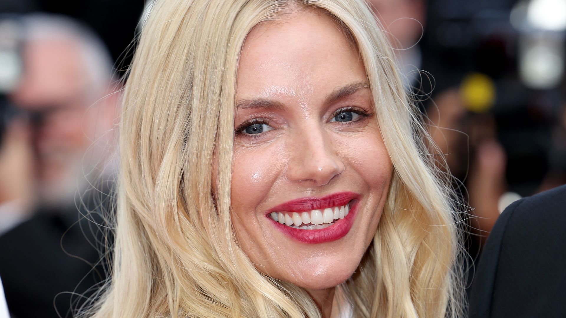 Pregnant Sienna Miller shows off blossoming bump in unexpected dress