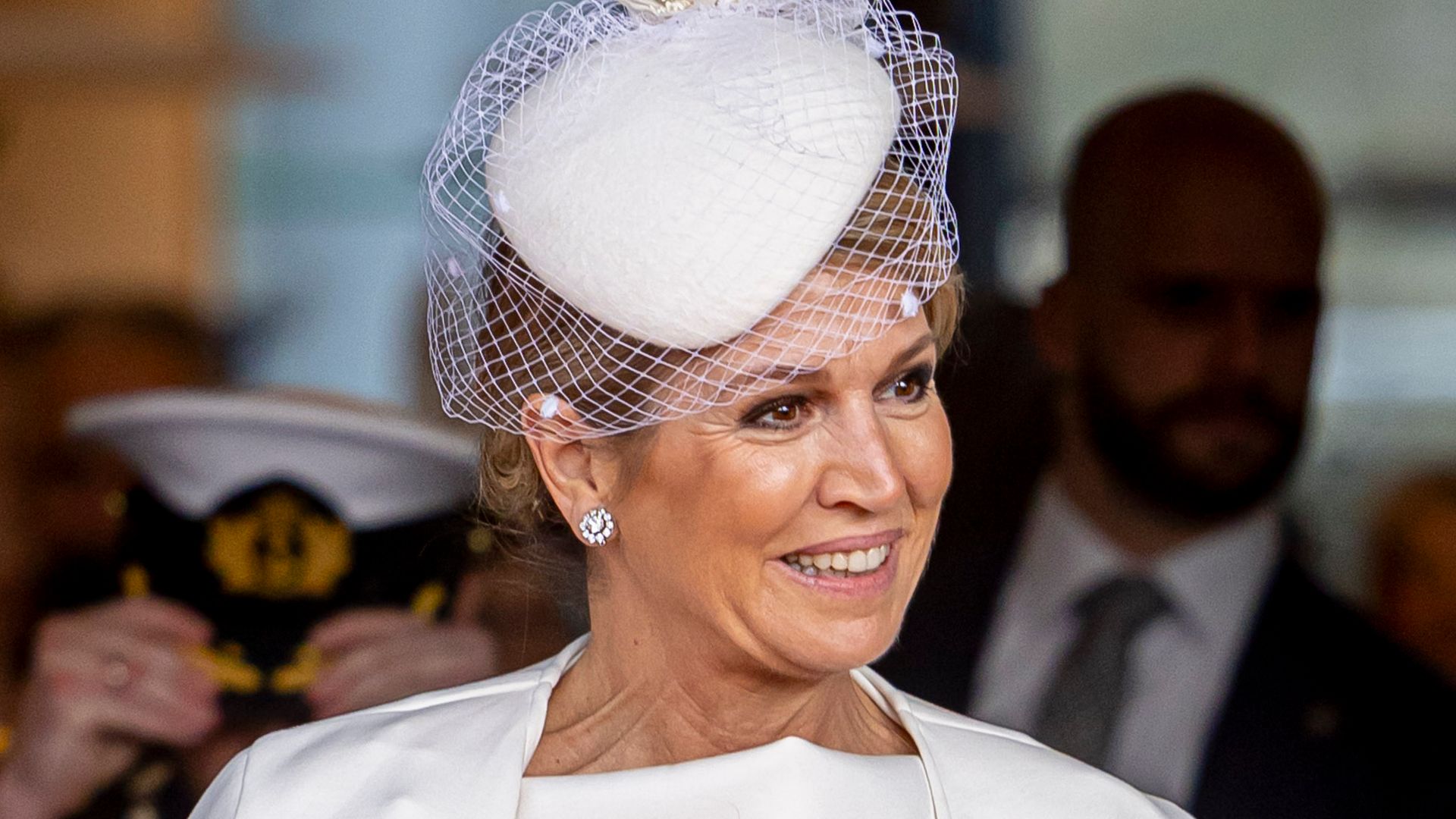 Queen Maxima’s bridal white cape dress is a masterclass in styling monochrome in your 50s