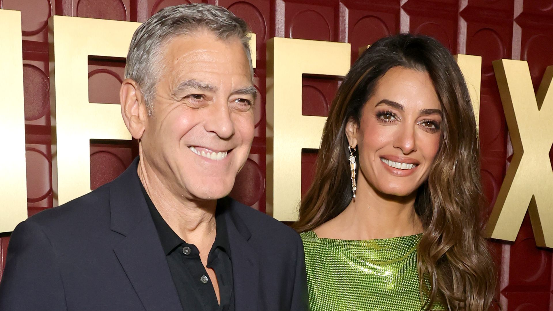 Amal Clooney puts It-girl spin on iconic Versace look in shimmering mini dress