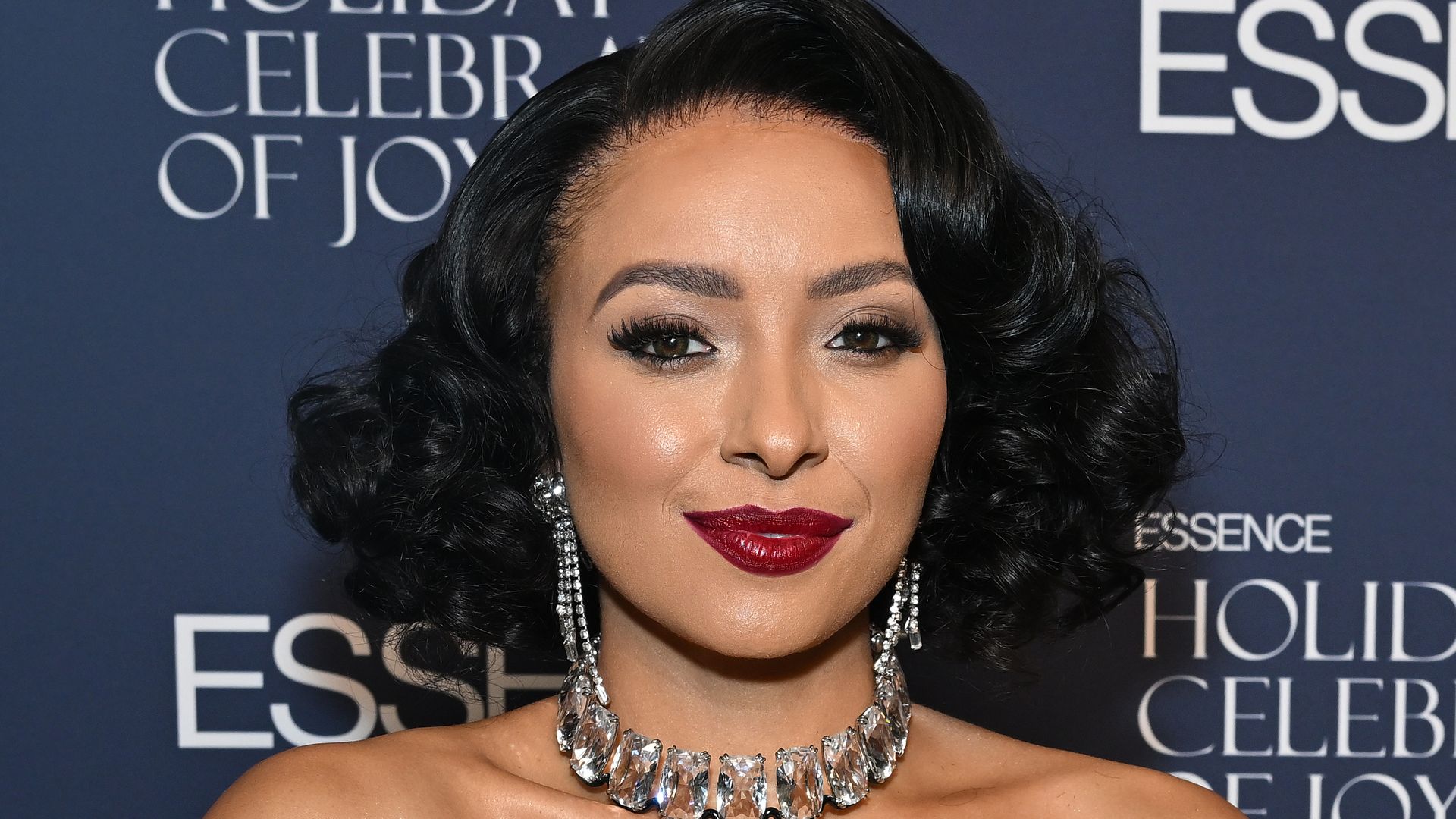Kat Graham stuns in sheer night out top – see