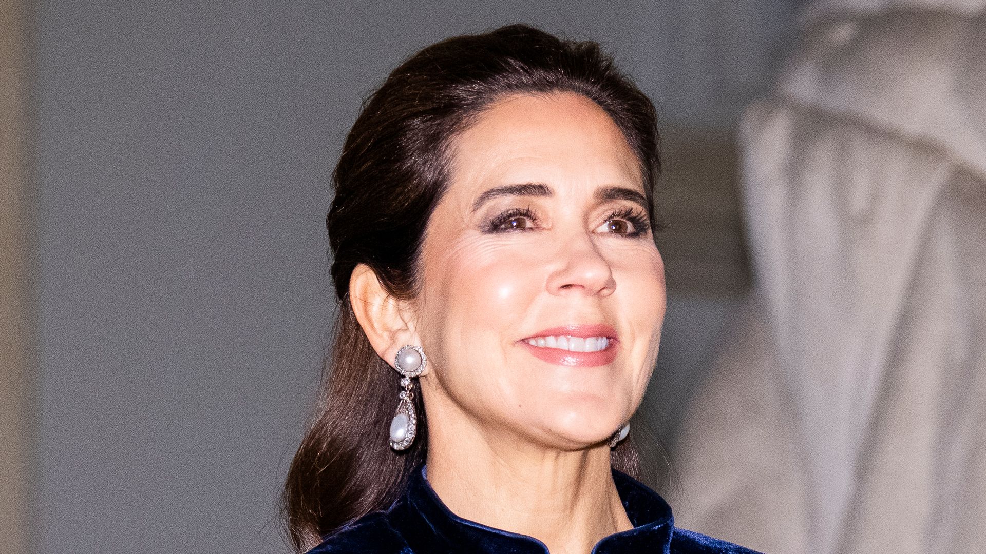 Queen Mary rings in 2026 in velvet mermaid skirt