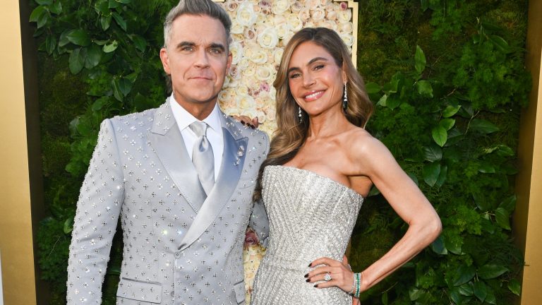 Robbie Williams moves to Caribbean island paradise after banking HUGE sum buying & selling property