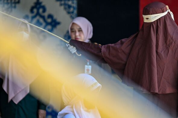 Sharia Law horror as couple caned 140 times after having sex outside of marriage