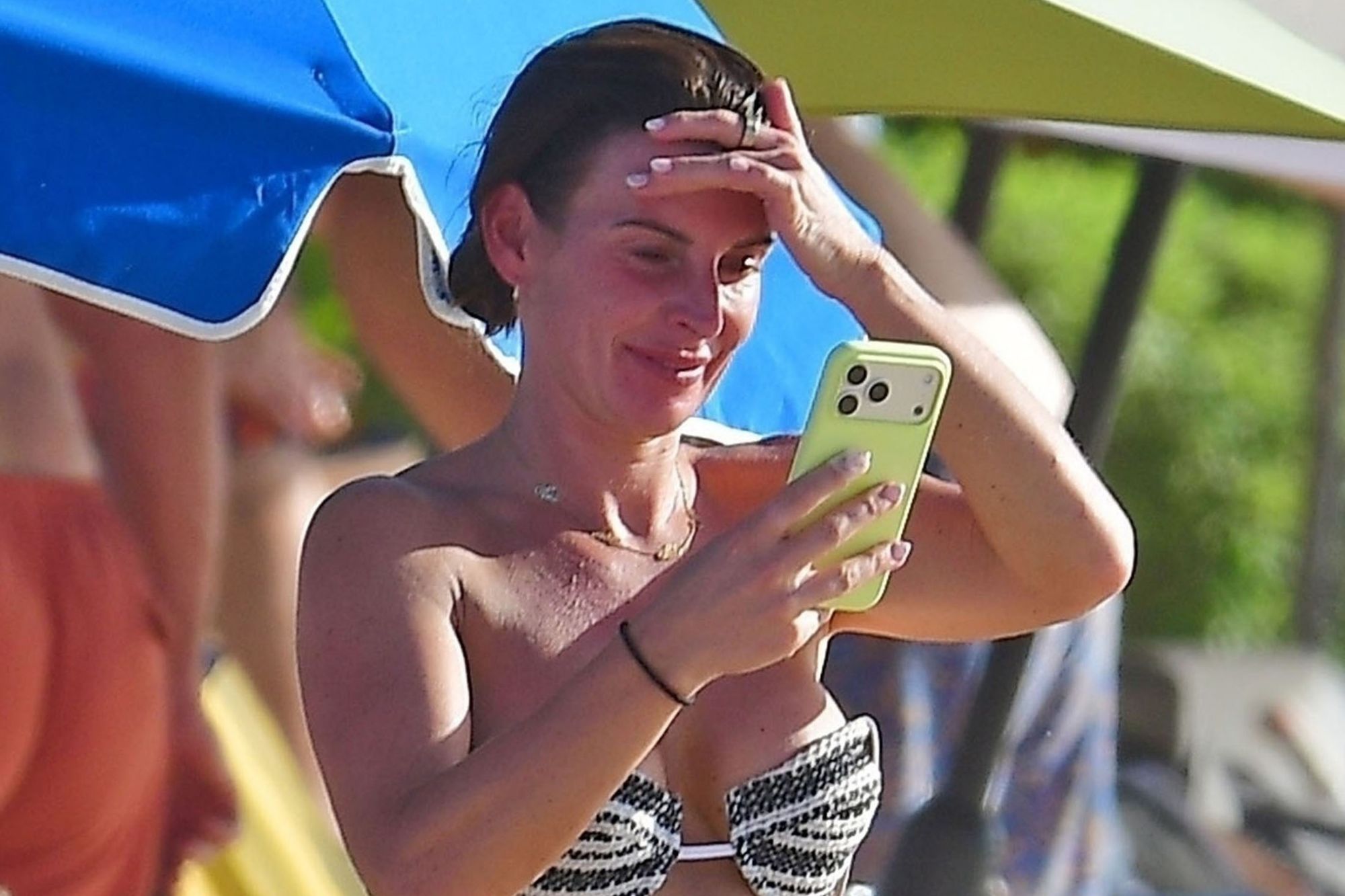 Topless Wayne Rooney relaxes on New Year Caribbean holiday as wife Coleen wows in bikini