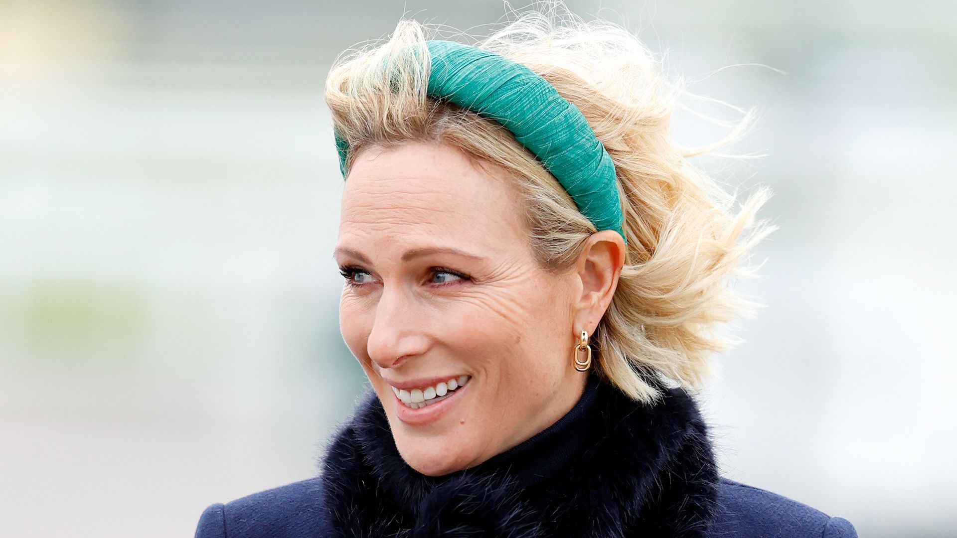 Zara Tindall, 44, braves the winter winds in ‘dramatic’ fur-lined coat – her take on 2026’s biggest trend