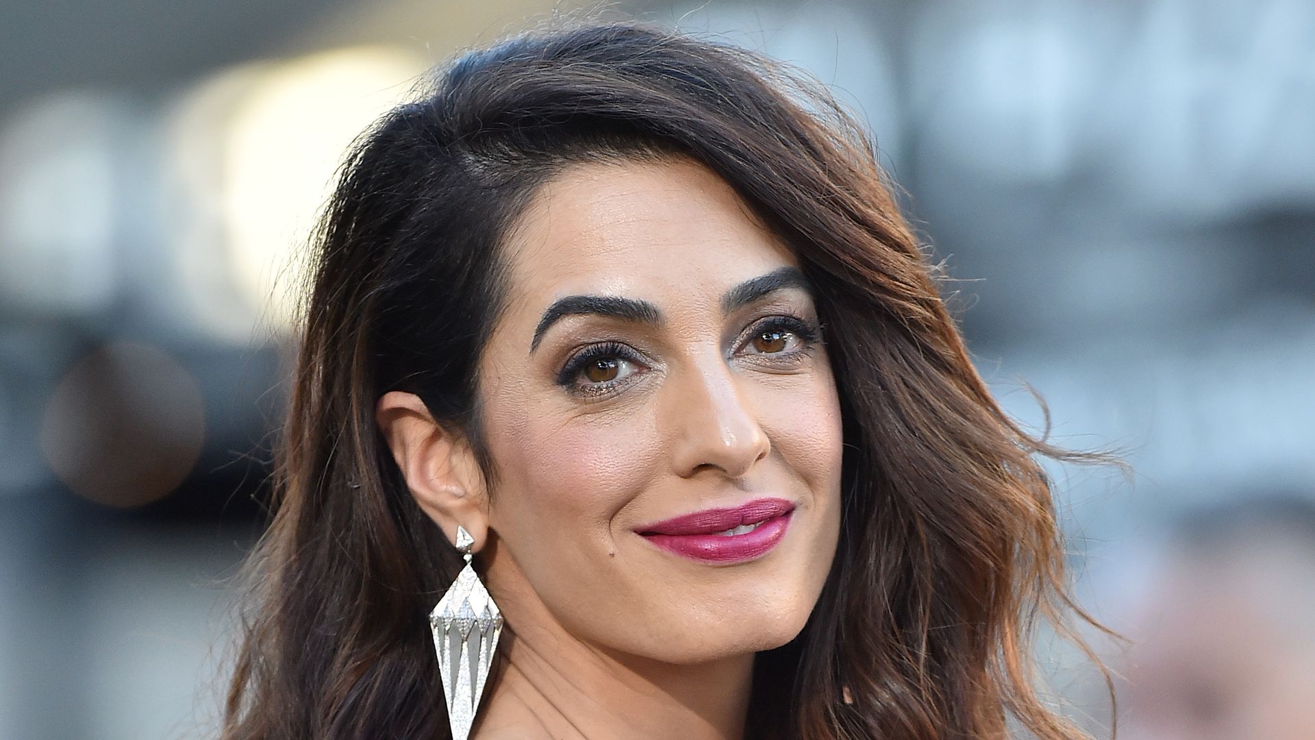 Amal Clooney’s golden goddess chainmail mini dress is party perfection