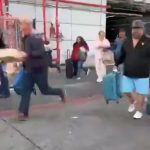 Cartel storm major airport firing guns as passengers rush to flee horror scenes