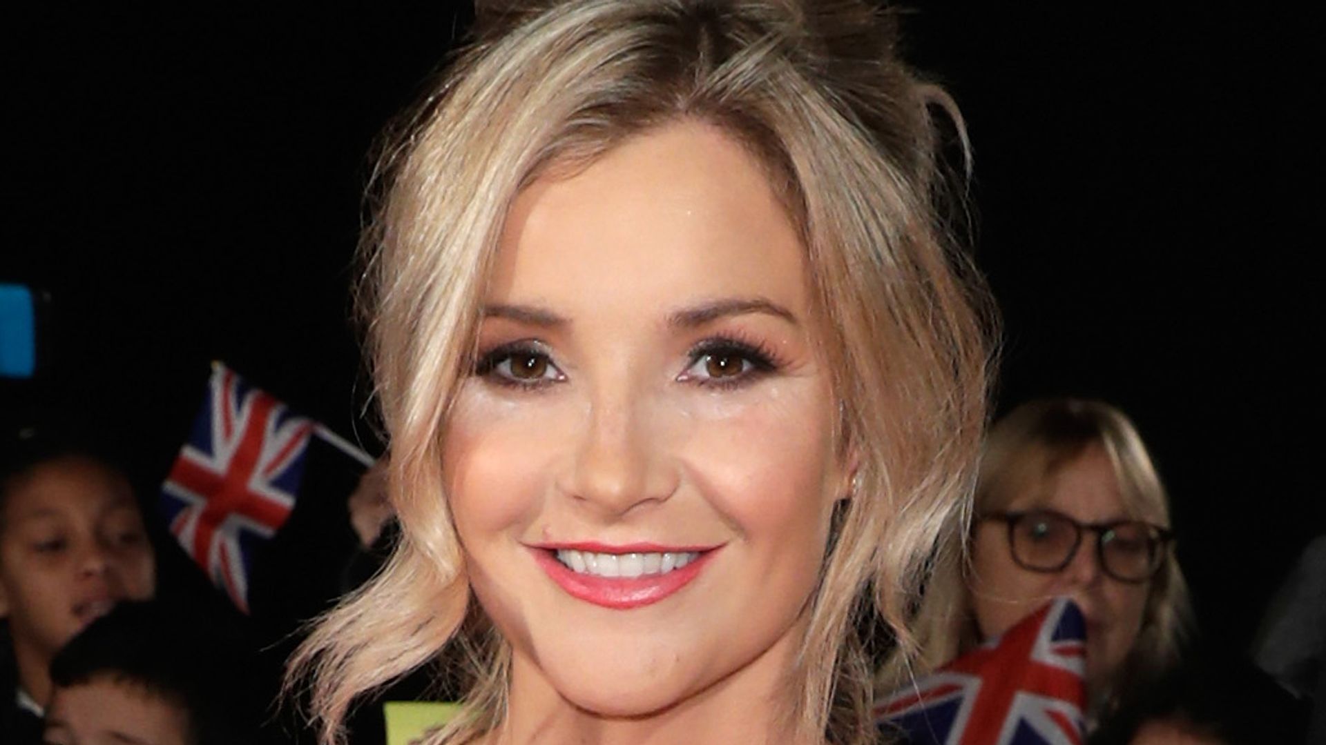 Helen Skelton shows off her svelte curves in sculpting denim dress and killer heels